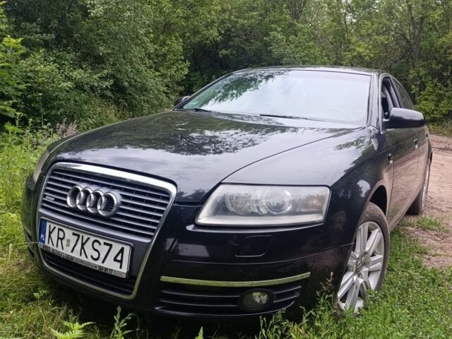 Черный Ауди А6, объемом двигателя 2 л и пробегом 420 тыс. км за 4600 $, фото 1 на Automoto.ua