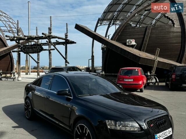 Чорний Ауді А6, об'ємом двигуна 1.97 л та пробігом 260 тис. км за 10500 $, фото 1 на Automoto.ua
