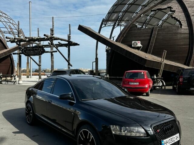 Черный Ауди А6, объемом двигателя 2 л и пробегом 260 тыс. км за 9100 $, фото 1 на Automoto.ua