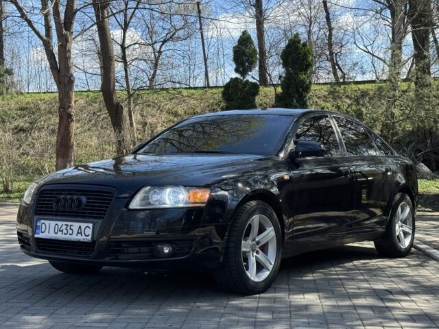 Черный Ауди А6, объемом двигателя 2 л и пробегом 340 тыс. км за 7200 $, фото 1 на Automoto.ua