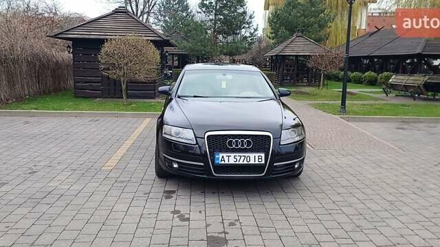 Черный Ауди А6, объемом двигателя 2 л и пробегом 325 тыс. км за 6900 $, фото 1 на Automoto.ua