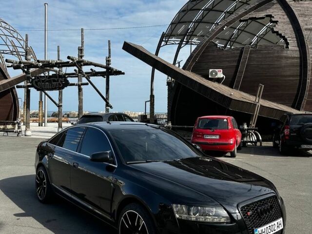 Черный Ауди А6, объемом двигателя 2 л и пробегом 260 тыс. км за 10500 $, фото 1 на Automoto.ua