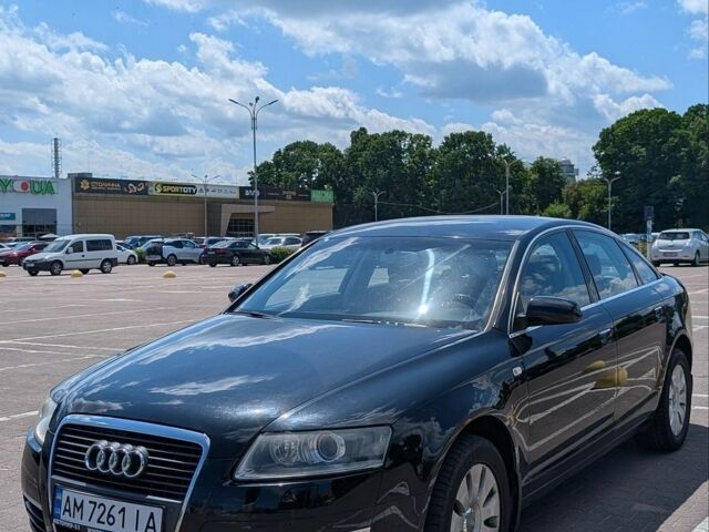 Черный Ауди А6, объемом двигателя 2.39 л и пробегом 140 тыс. км за 7500 $, фото 1 на Automoto.ua