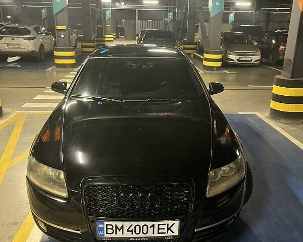 Черный Ауди А6, объемом двигателя 1.97 л и пробегом 303 тыс. км за 7500 $, фото 1 на Automoto.ua