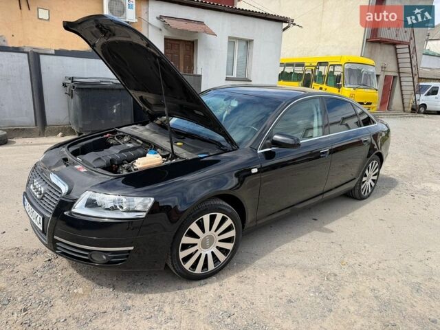 Черный Ауди А6, объемом двигателя 1.98 л и пробегом 165 тыс. км за 10350 $, фото 1 на Automoto.ua