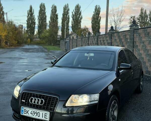 Черный Ауди А6, объемом двигателя 2 л и пробегом 247 тыс. км за 9200 $, фото 1 на Automoto.ua