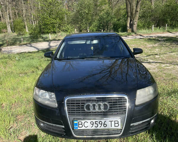 Черный Ауди А6, объемом двигателя 1.97 л и пробегом 235 тыс. км за 8500 $, фото 1 на Automoto.ua