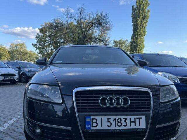Черный Ауди А6, объемом двигателя 2 л и пробегом 480 тыс. км за 6520 $, фото 1 на Automoto.ua