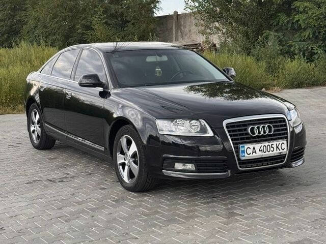 Черный Ауди А6, объемом двигателя 2 л и пробегом 194 тыс. км за 9300 $, фото 1 на Automoto.ua