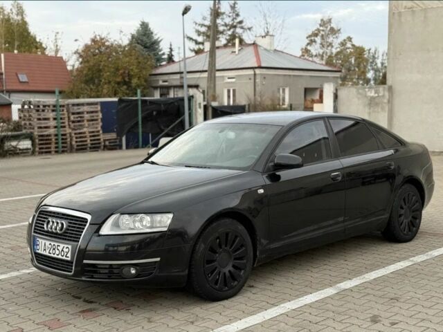 Черный Ауди А6, объемом двигателя 2 л и пробегом 230 тыс. км за 2400 $, фото 1 на Automoto.ua