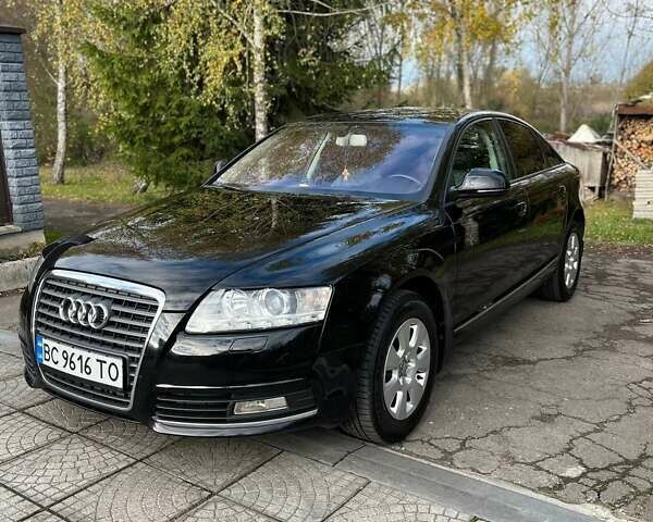 Черный Ауди А6, объемом двигателя 1.98 л и пробегом 164 тыс. км за 7500 $, фото 1 на Automoto.ua