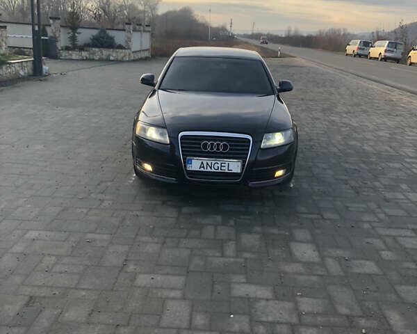 Черный Ауди А6, объемом двигателя 2 л и пробегом 300 тыс. км за 7800 $, фото 1 на Automoto.ua