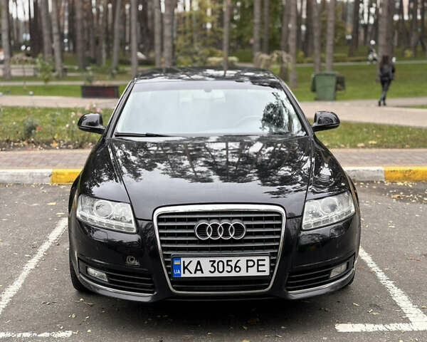 Черный Ауди А6, объемом двигателя 1.98 л и пробегом 264 тыс. км за 8700 $, фото 1 на Automoto.ua
