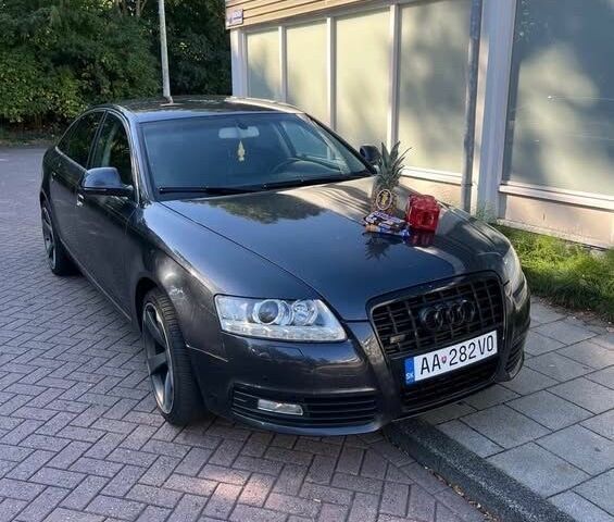 Черный Ауди А6, объемом двигателя 3 л и пробегом 400 тыс. км за 6201 $, фото 1 на Automoto.ua