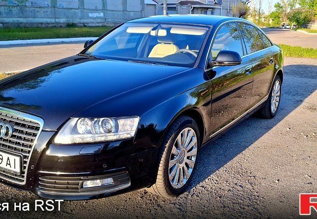 Черный Ауди А6, объемом двигателя 2.8 л и пробегом 250 тыс. км за 9000 $, фото 1 на Automoto.ua