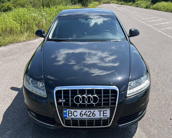 Чорний Ауді А6, об'ємом двигуна 1.97 л та пробігом 325 тис. км за 11500 $, фото 1 на Automoto.ua