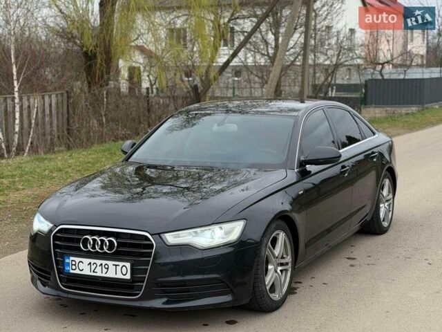 Чорний Ауді А6, об'ємом двигуна 2 л та пробігом 300 тис. км за 9999 $, фото 1 на Automoto.ua