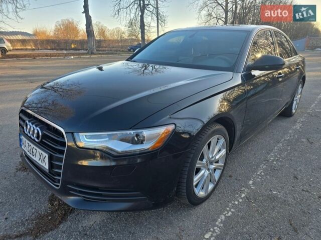 Чорний Ауді А6, об'ємом двигуна 1.98 л та пробігом 304 тис. км за 11999 $, фото 1 на Automoto.ua