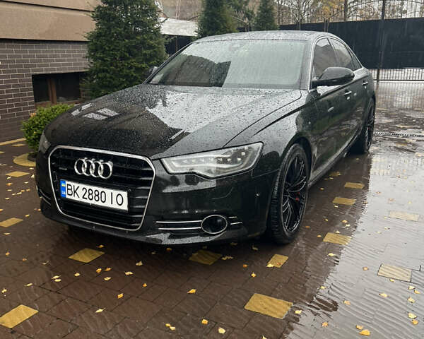 Черный Ауди А6, объемом двигателя 2.97 л и пробегом 194 тыс. км за 18500 $, фото 1 на Automoto.ua