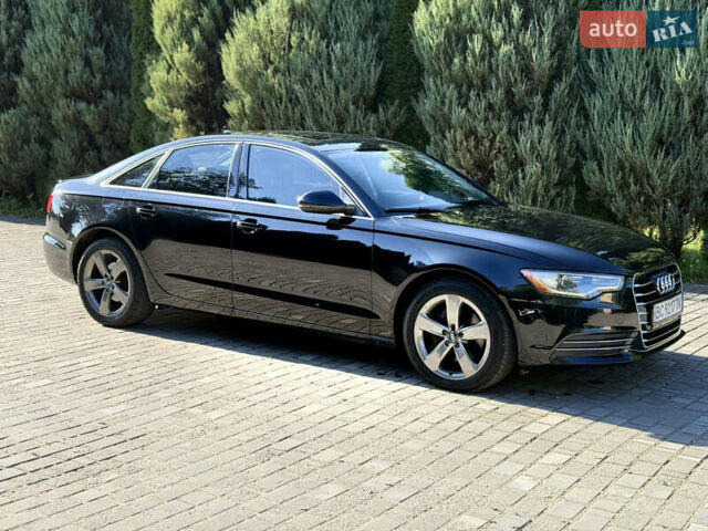 Черный Ауди А6, объемом двигателя 2 л и пробегом 285 тыс. км за 12800 $, фото 1 на Automoto.ua