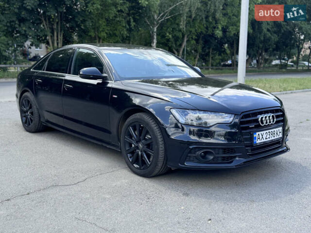 Черный Ауди А6, объемом двигателя 3 л и пробегом 157 тыс. км за 13300 $, фото 1 на Automoto.ua