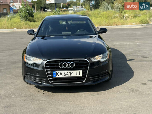 Черный Ауди А6, объемом двигателя 1.98 л и пробегом 235 тыс. км за 12500 $, фото 1 на Automoto.ua