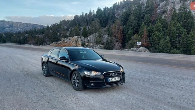 Черный Ауди А6, объемом двигателя 2 л и пробегом 265 тыс. км за 14000 $, фото 1 на Automoto.ua