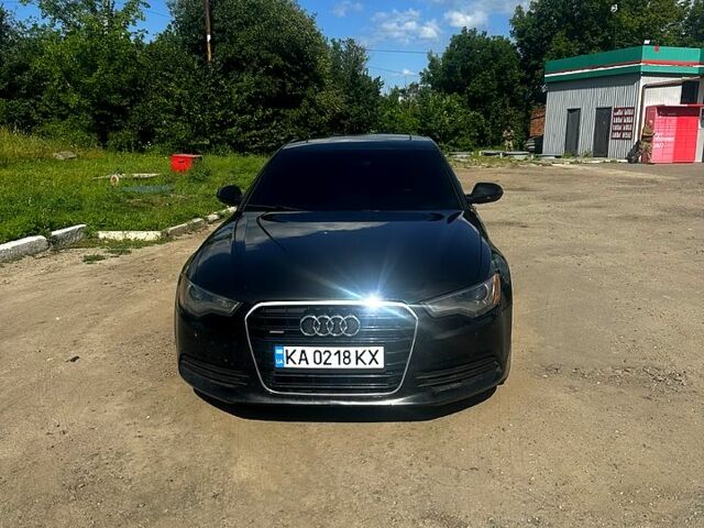 Черный Ауди А6, объемом двигателя 2 л и пробегом 303 тыс. км за 13100 $, фото 1 на Automoto.ua