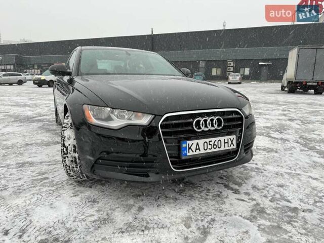 Черный Ауди А6, объемом двигателя 2 л и пробегом 220 тыс. км за 13850 $, фото 1 на Automoto.ua