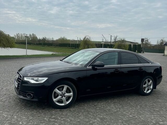 Чорний Ауді А6, об'ємом двигуна 1.97 л та пробігом 320 тис. км за 12500 $, фото 1 на Automoto.ua
