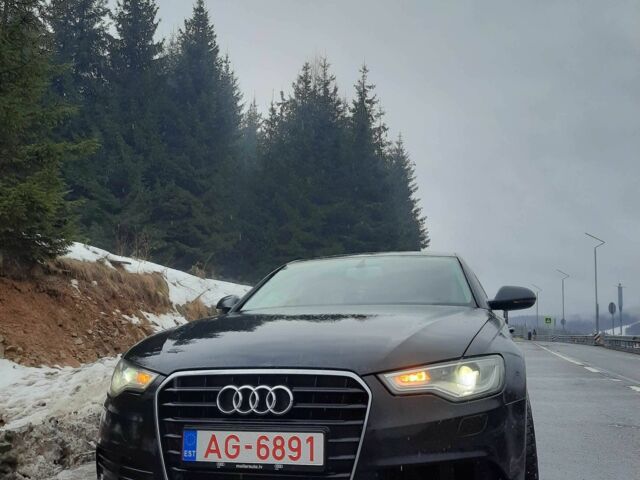 Черный Ауди А6, объемом двигателя 2 л и пробегом 222 тыс. км за 12550 $, фото 1 на Automoto.ua