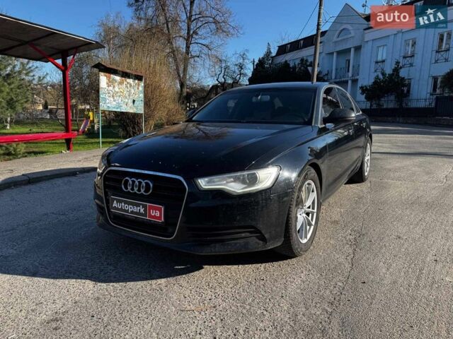 Чорний Ауді А6, об'ємом двигуна 2 л та пробігом 181 тис. км за 11290 $, фото 1 на Automoto.ua