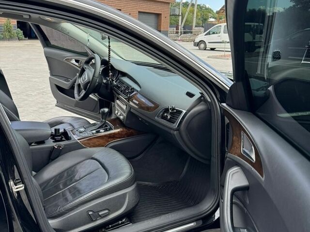 Чорний Ауді А6, об'ємом двигуна 2 л та пробігом 205 тис. км за 12800 $, фото 1 на Automoto.ua