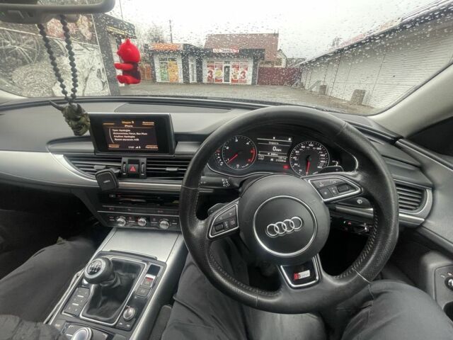 Черный Ауди А6, объемом двигателя 2 л и пробегом 215 тыс. км за 5999 $, фото 1 на Automoto.ua