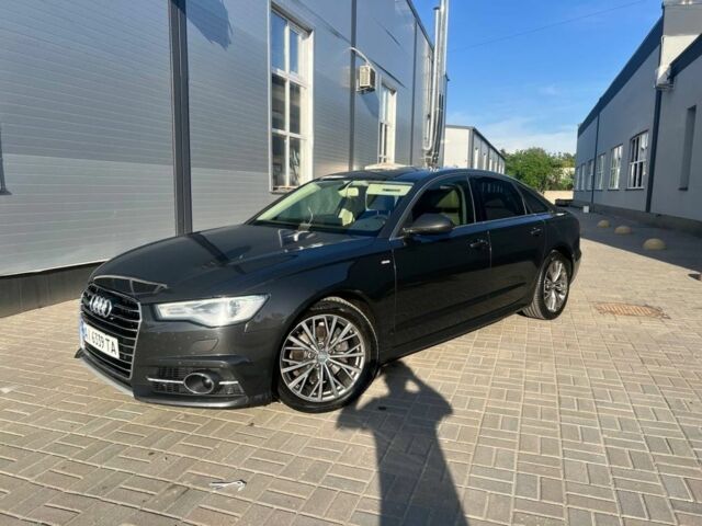 Чорний Ауді А6, об'ємом двигуна 2 л та пробігом 235 тис. км за 11800 $, фото 1 на Automoto.ua