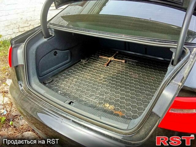 Черный Ауди А6, объемом двигателя 2 л и пробегом 185 тыс. км за 11790 $, фото 1 на Automoto.ua