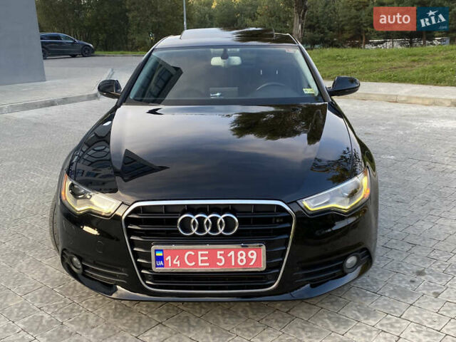 Черный Ауди А6, объемом двигателя 2 л и пробегом 245 тыс. км за 11500 $, фото 1 на Automoto.ua