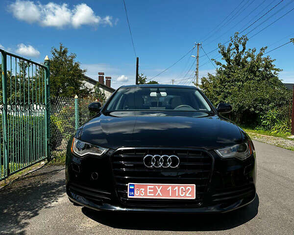 Черный Ауди А6, объемом двигателя 2 л и пробегом 247 тыс. км за 12800 $, фото 1 на Automoto.ua