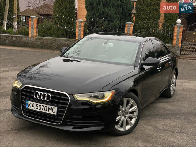 Черный Ауди А6, объемом двигателя 2 л и пробегом 220 тыс. км за 14500 $, фото 1 на Automoto.ua