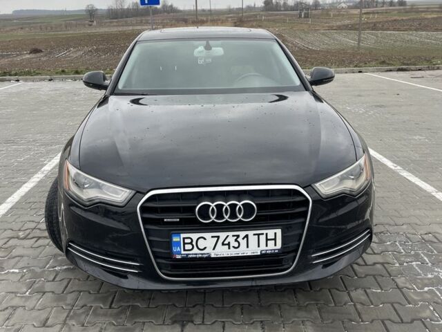 Чорний Ауді А6, об'ємом двигуна 2 л та пробігом 194 тис. км за 13700 $, фото 1 на Automoto.ua