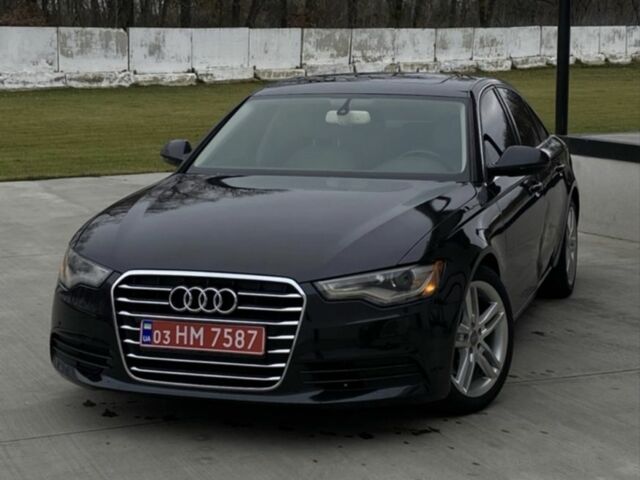 Черный Ауди А6, объемом двигателя 2 л и пробегом 300 тыс. км за 10300 $, фото 1 на Automoto.ua