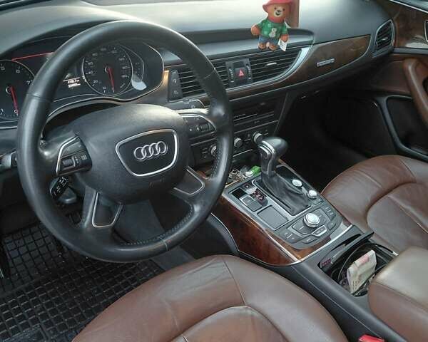 Черный Ауди А6, объемом двигателя 1.98 л и пробегом 330 тыс. км за 12700 $, фото 1 на Automoto.ua