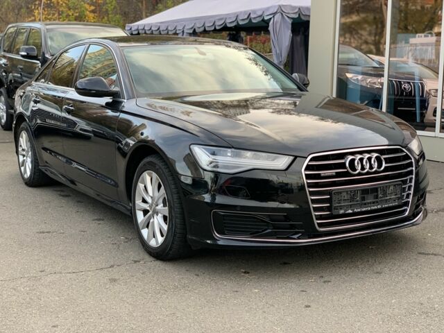 Черный Ауди А6, объемом двигателя 2.8 л и пробегом 142 тыс. км за 22500 $, фото 1 на Automoto.ua