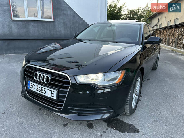 Черный Ауди А6, объемом двигателя 2 л и пробегом 177 тыс. км за 13200 $, фото 1 на Automoto.ua