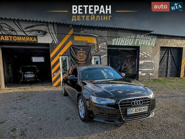 Черный Ауди А6, объемом двигателя 2 л и пробегом 228 тыс. км за 11000 $, фото 1 на Automoto.ua