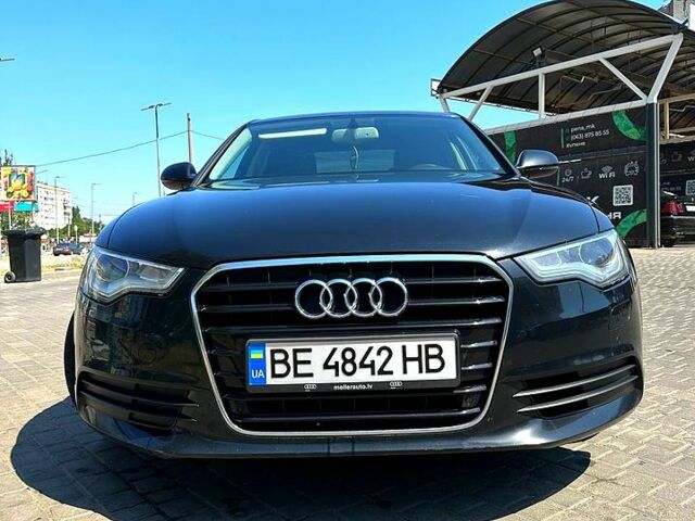 Чорний Ауді А6, об'ємом двигуна 2 л та пробігом 223 тис. км за 12690 $, фото 1 на Automoto.ua