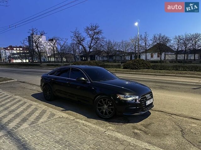 Чорний Ауді А6, об'ємом двигуна 2 л та пробігом 398 тис. км за 12453 $, фото 1 на Automoto.ua