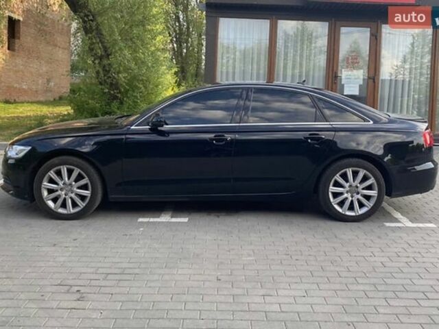 Чорний Ауді А6, об'ємом двигуна 2 л та пробігом 193 тис. км за 15000 $, фото 1 на Automoto.ua