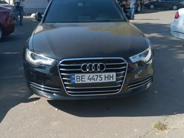 Черный Ауди А6, объемом двигателя 2 л и пробегом 300 тыс. км за 13500 $, фото 1 на Automoto.ua