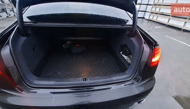 Чорний Ауді А6, об'ємом двигуна 2 л та пробігом 142 тис. км за 12900 $, фото 1 на Automoto.ua